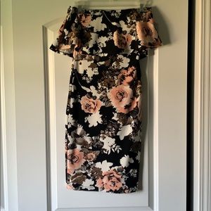 Bodycon strapless flower dress. Bust has ruffles